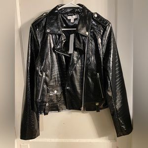 NWT- “ Top Shop” shiny leather zippered jacket! Retail $100. Size 8.